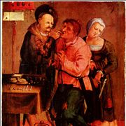 Picture Of Medieval Dentist Removing Tooth